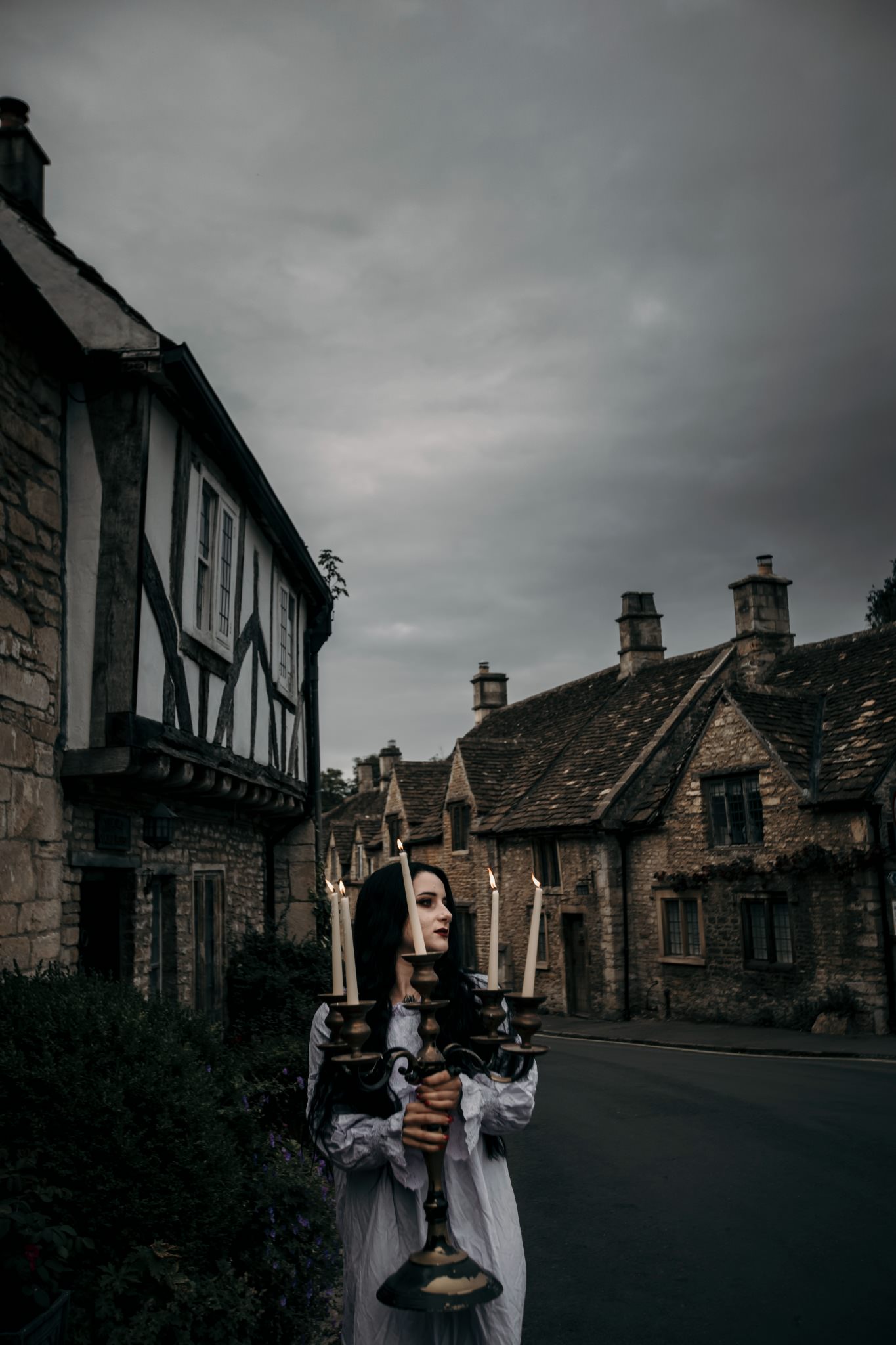 Horror photoshoot with candles in an old medieval village in the Cotswolds